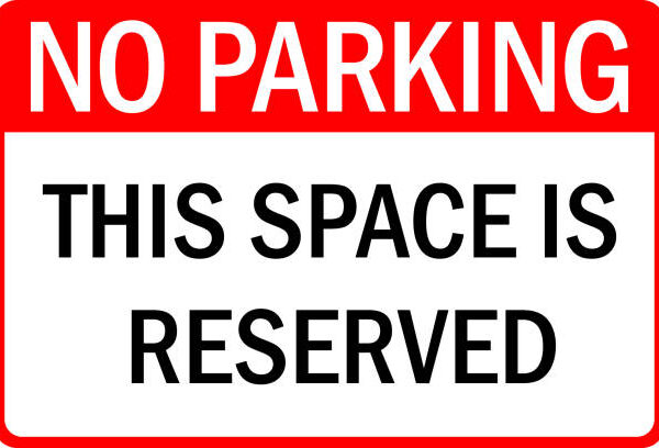 Sign no parking this space is reserved